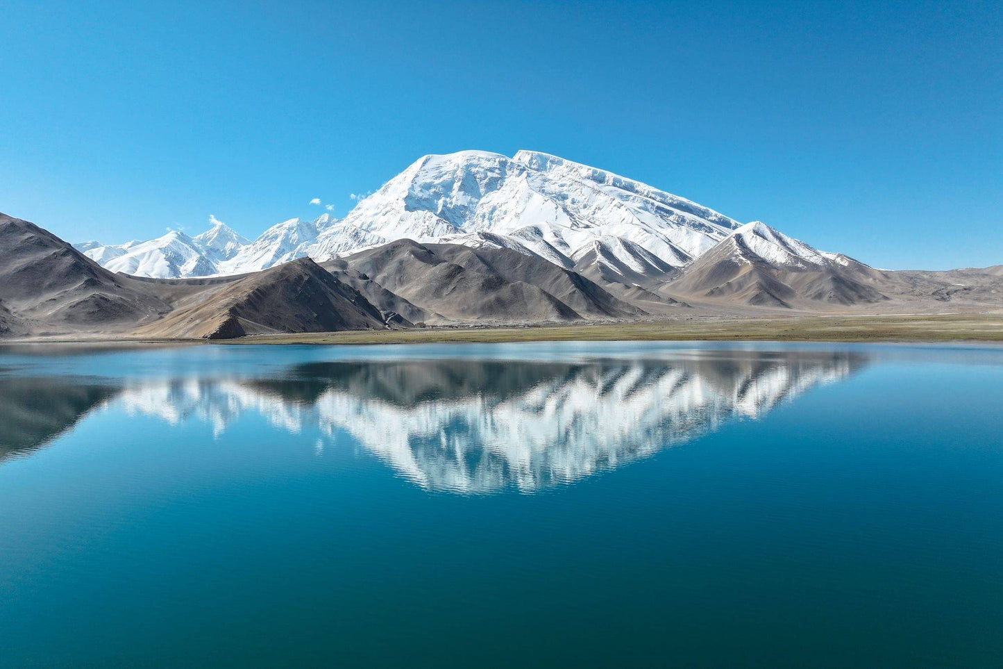 7-Day Xinjiang Tour (Kashgar, Baisha Lake, Karakol Lake, Muztagh Ata, Panlong Ancient Road, Shache, Artush Tianmen)
