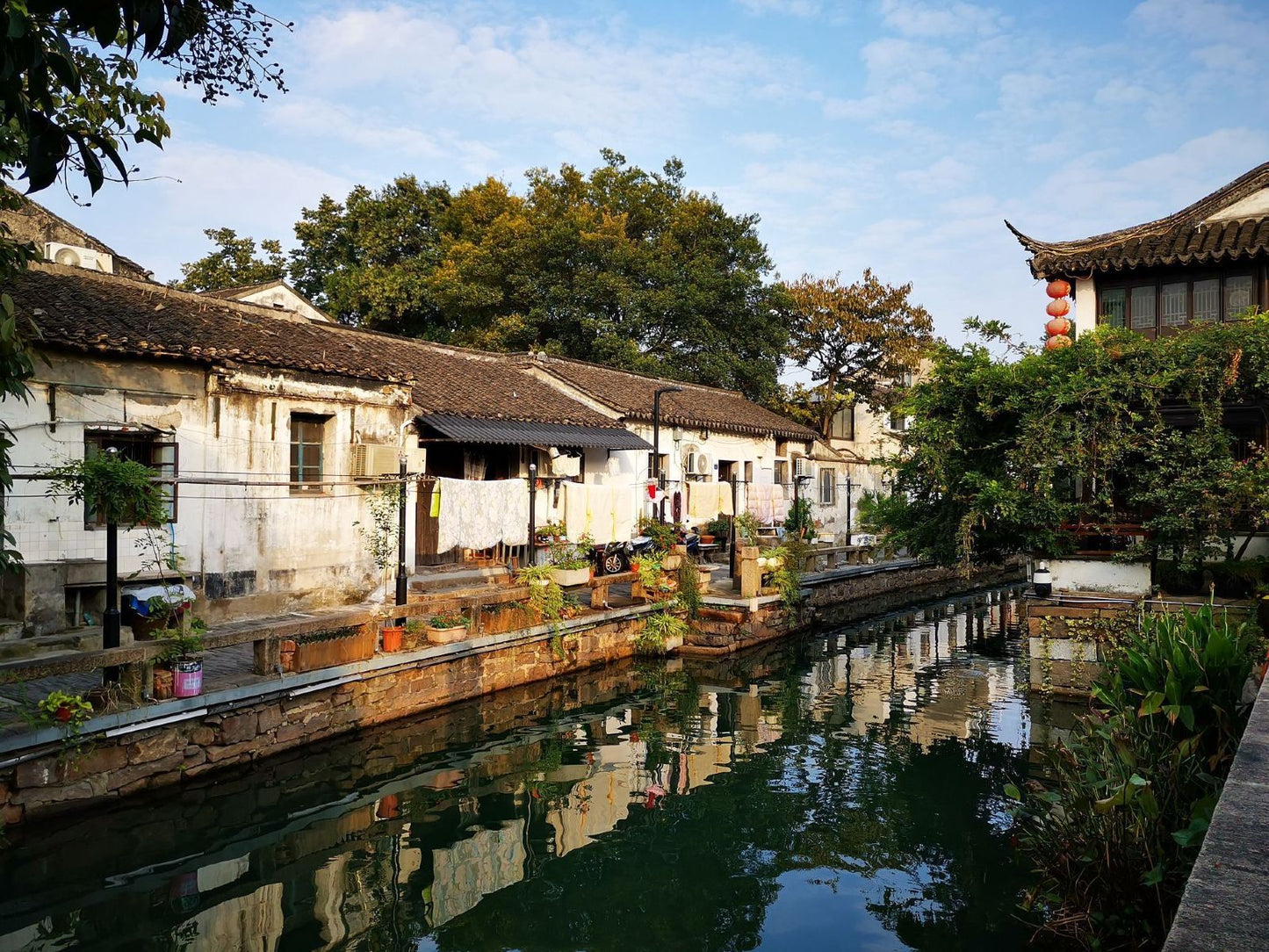 Traditional water town scene in China, showcasing ancient architecture and serene canals, perfect for exploring during the 30-Day China Panoramic Deep Tour.